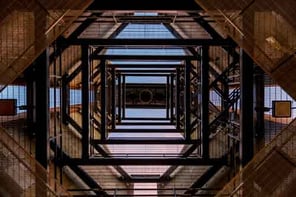 Perspective of looking up a stairway to the outside.